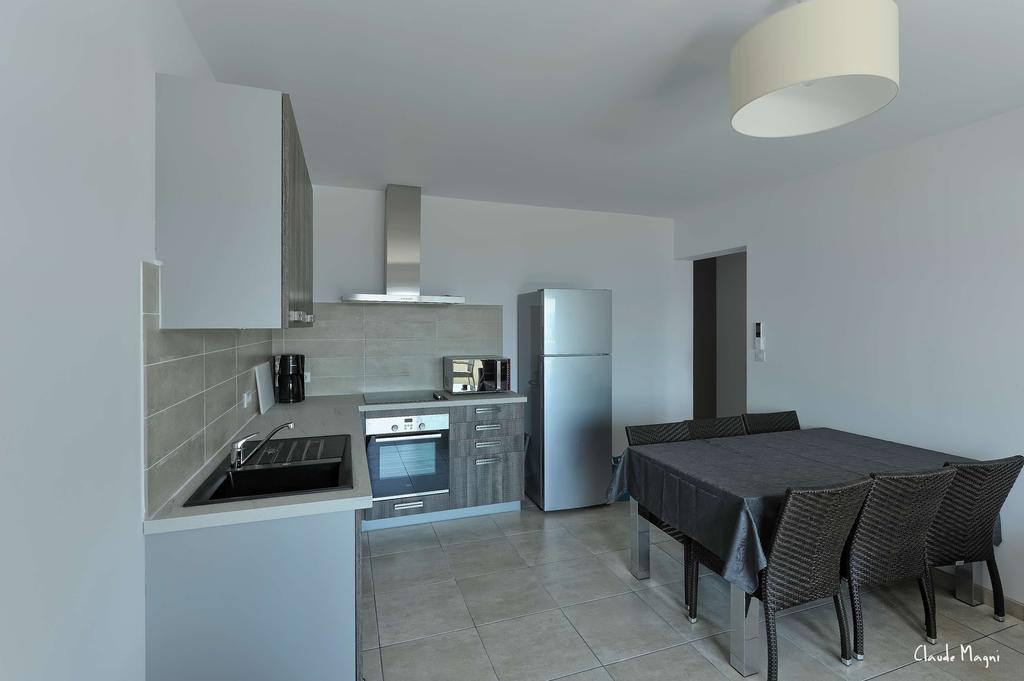 Residence Giovanello Porto Pollo Zimmer foto